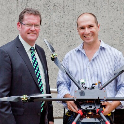 The Honourable Dr John McVeigh, MP Minister for Agriculture, Fisheries and Forestry; and Armando Navas, e-Gatton Project Officer with the hexacopter used to teach agriculture at UQ Gatton. 